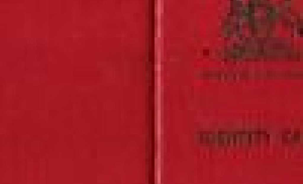 Couverture d’une carte d’identité rouge.